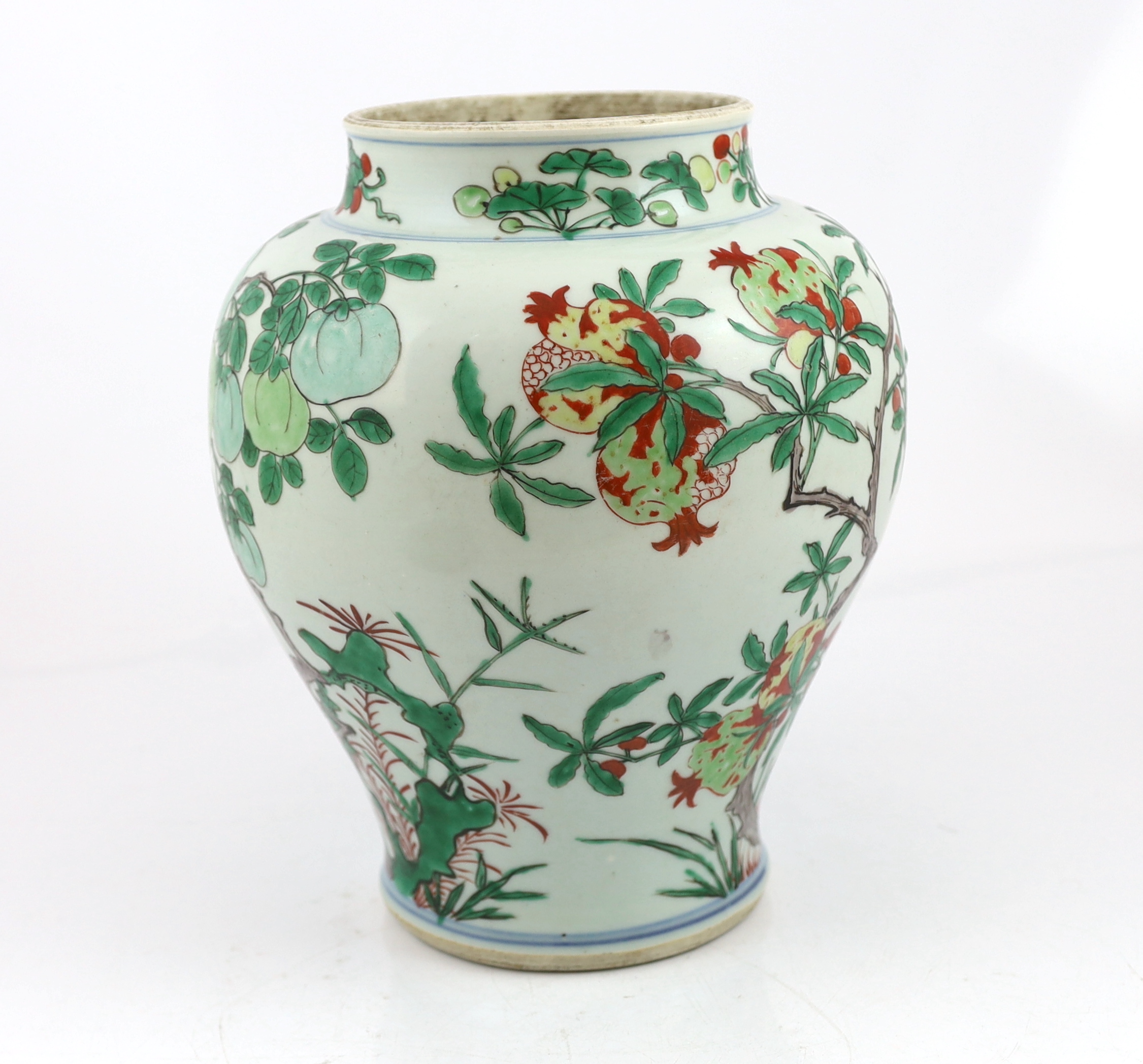 A Chinese wucai ‘pomegranate’ baluster vase, Transitional, Shunzhi period, c.1650